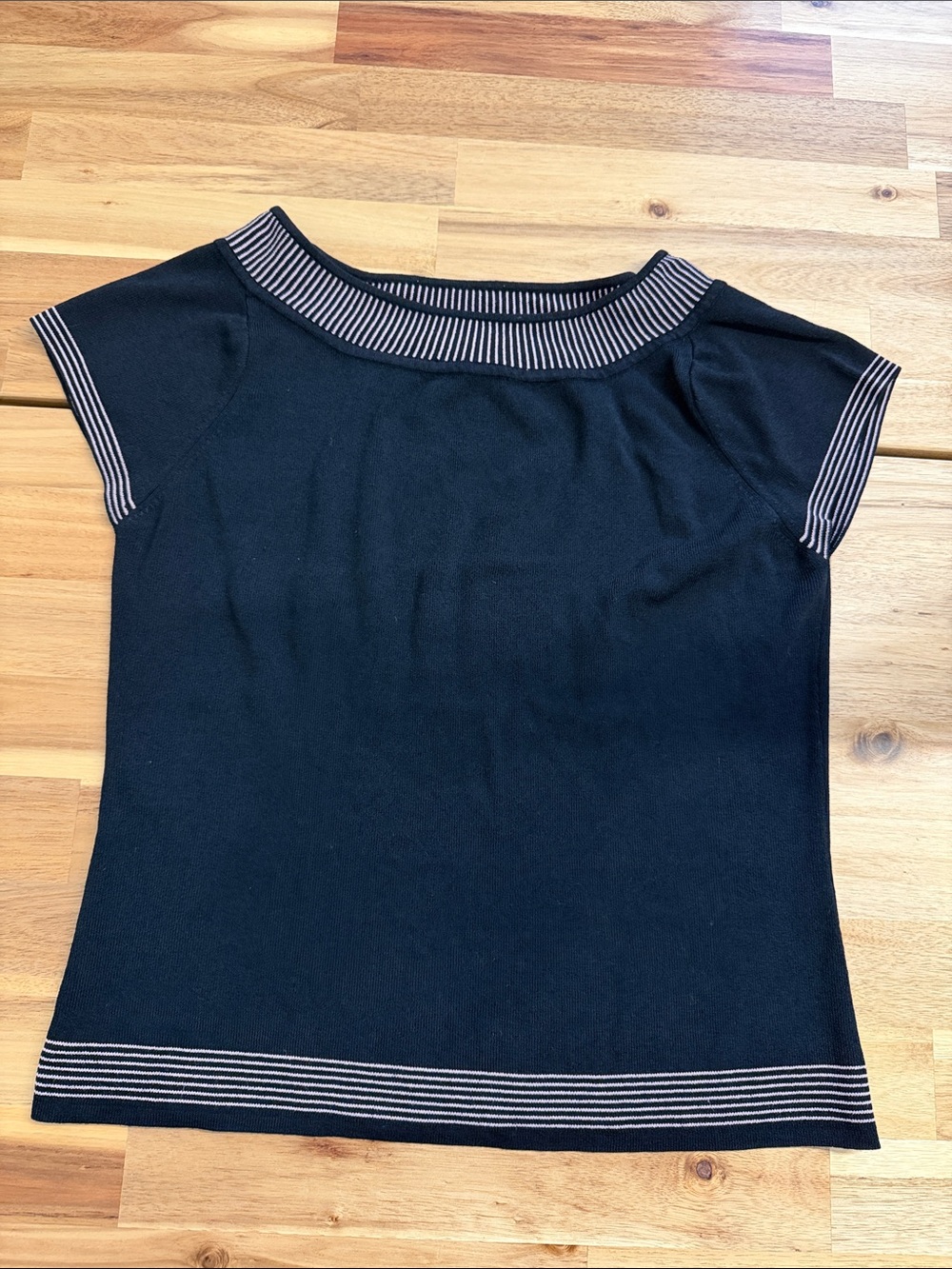 Black Short-Sleeve Knit Top with Contrasting Light Pink Stripe Trim